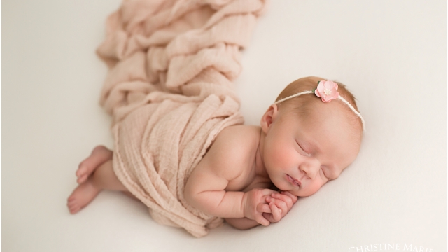 Cradling Cuteness: Capturing the Beauty of Newborn Photography